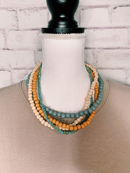 Wooden necklace trio with glass beads